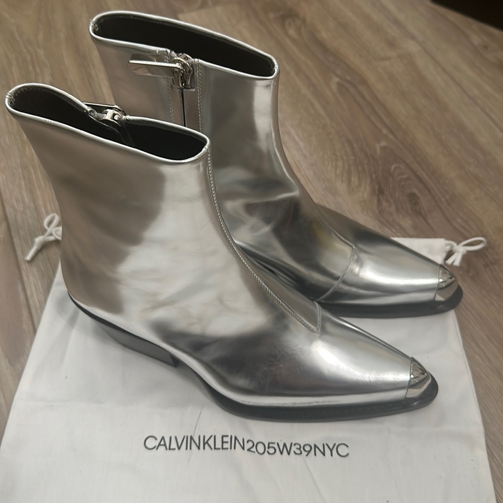Calvin Klein silver cap toe boots. 205W39NYC